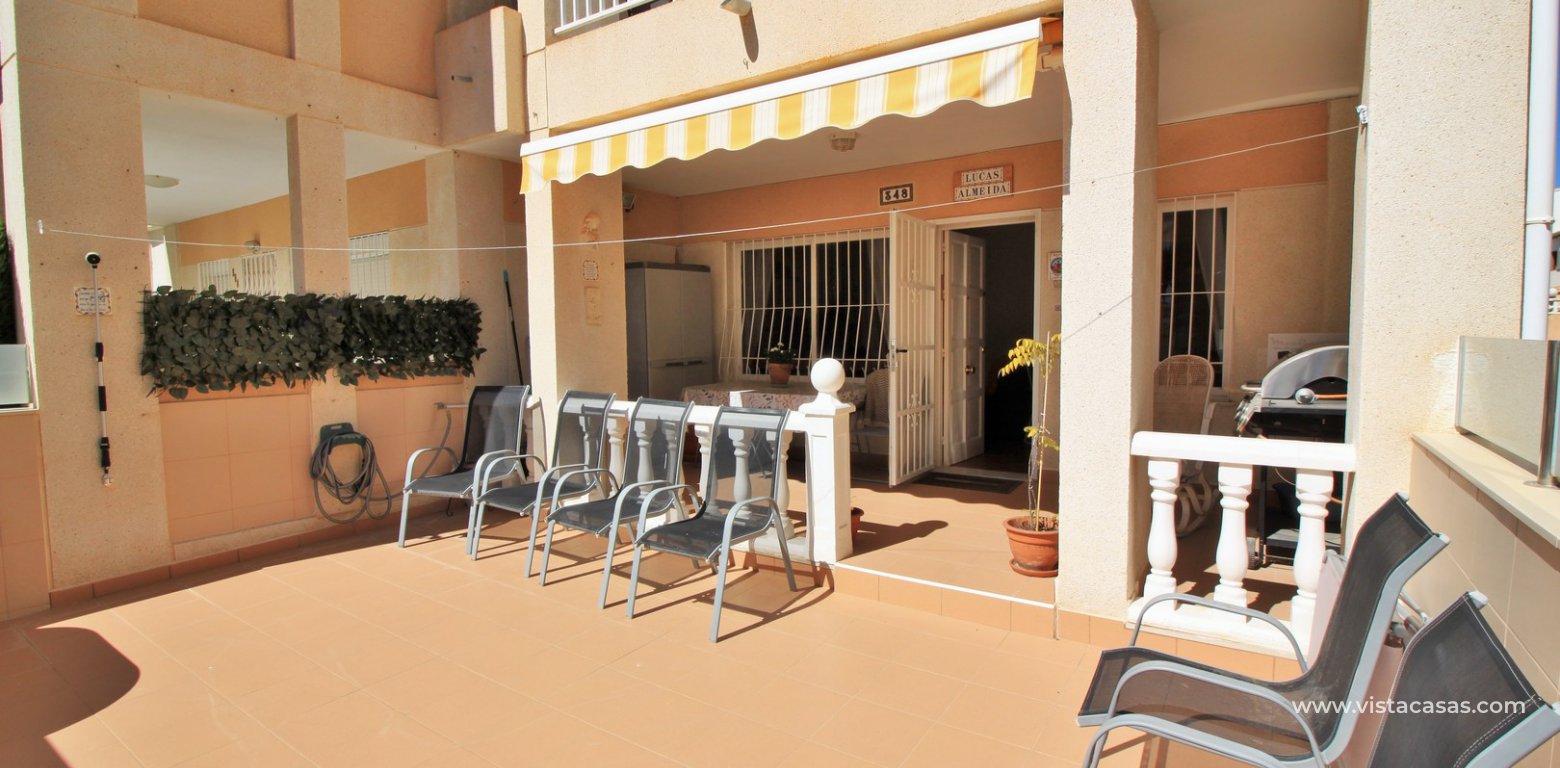 South facing 2 bedroom ground floor apartment directly facing the pool for sale in Los Frutales V La Rosaleda Torrevieja front terrace