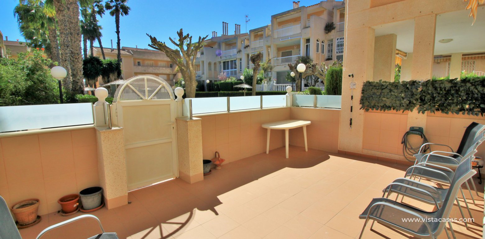 South facing 2 bedroom ground floor apartment directly facing the pool for sale in Los Frutales V La Rosaleda Torrevieja terrace