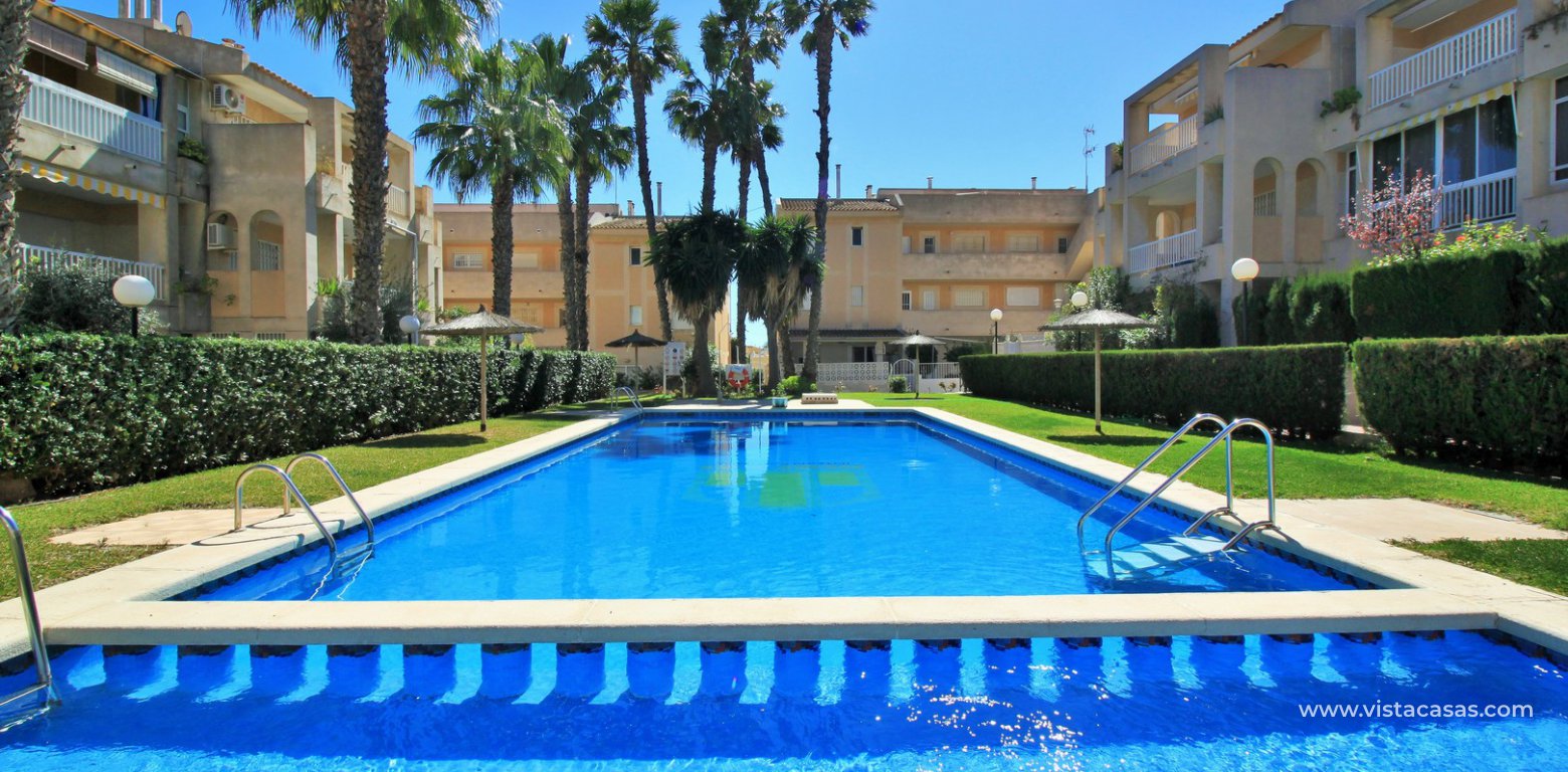 South facing 2 bedroom ground floor apartment directly facing the pool for sale in Los Frutales V La Rosaleda Torrevieja communal pool