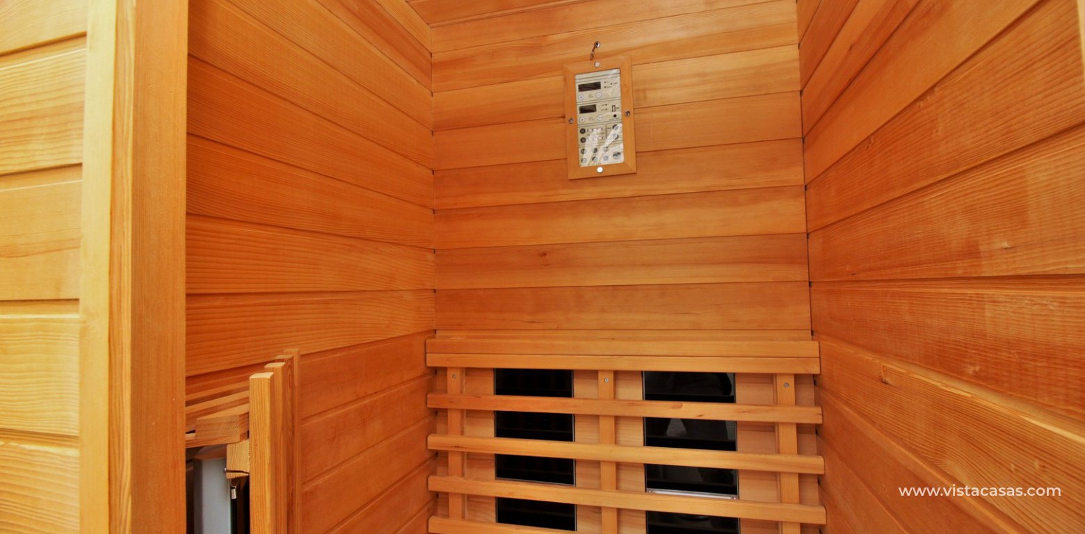 Detached villa with underbuild for sale in Villamartin sauna cabin