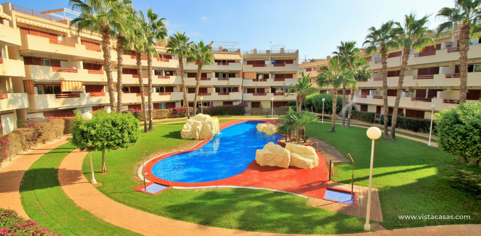 South facing penthouse for sale in El Rincon Playa Flamenca swimming pool gardens
