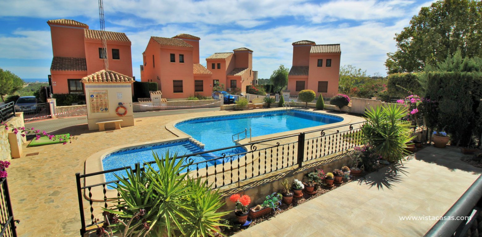 Detached villa overlooking the pool for sale in La Cañada San Miguel pool view terrace