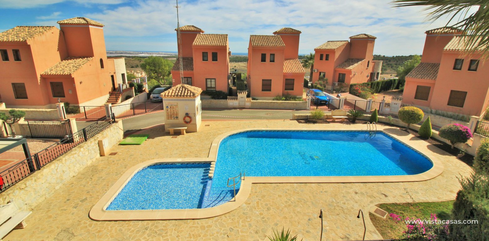 Detached villa overlooking the pool for sale in La Cañada San Miguel balcony pool view