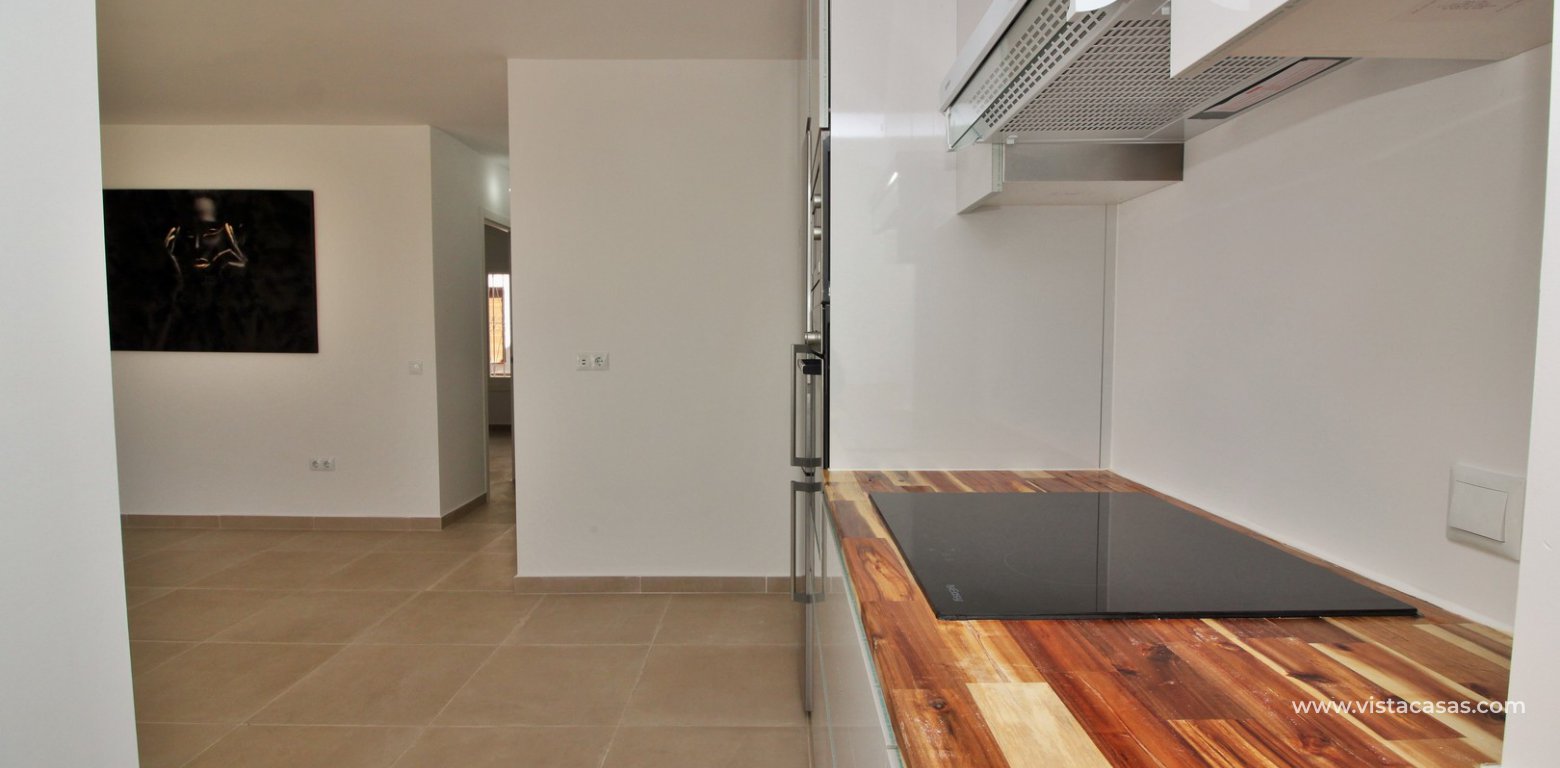 Modern South facing ground floor apartment for sale in Los Dolses kitchen 3
