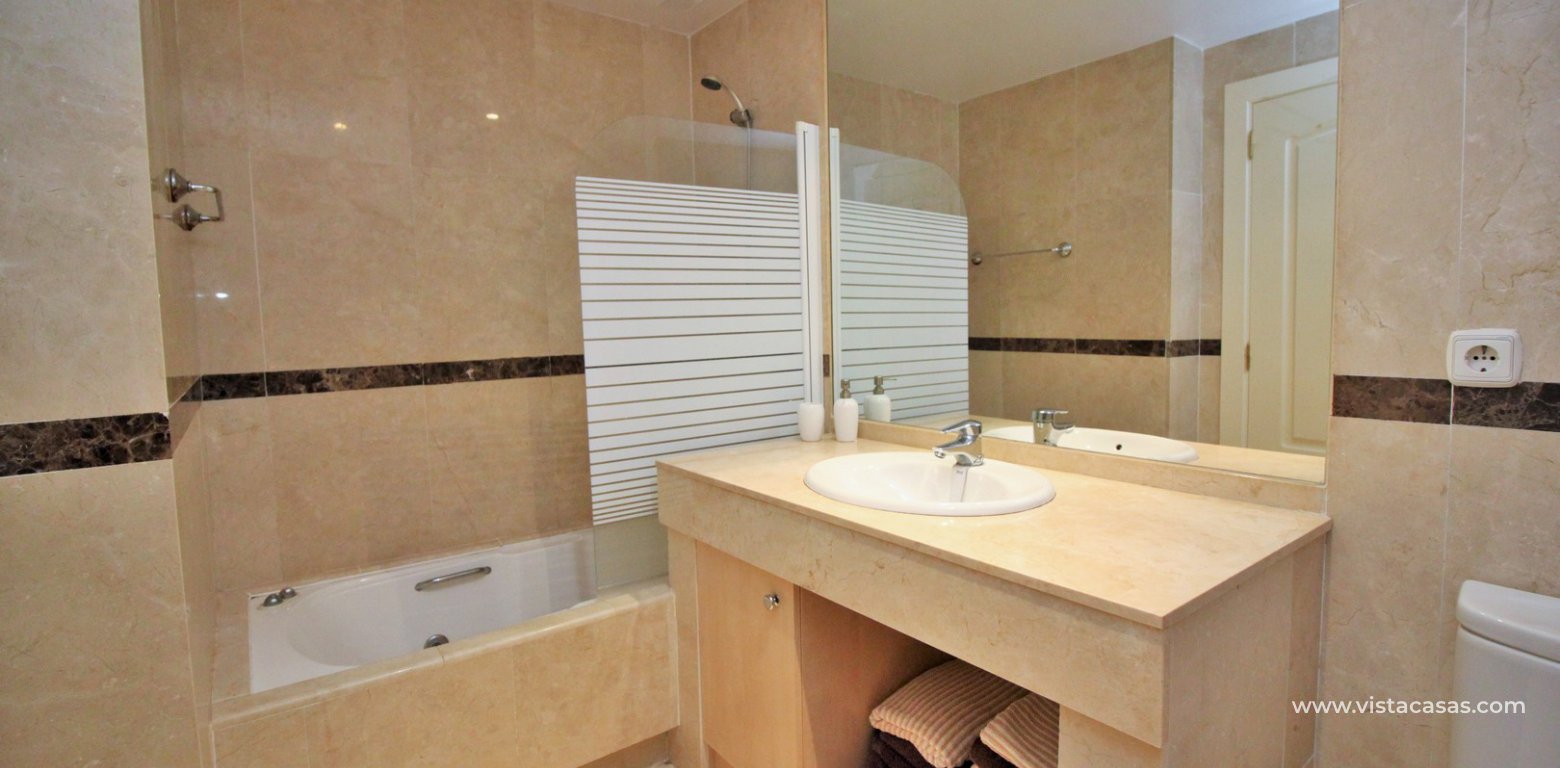 Apartment for sale in Villamartin master bedroom en-suite bathroom