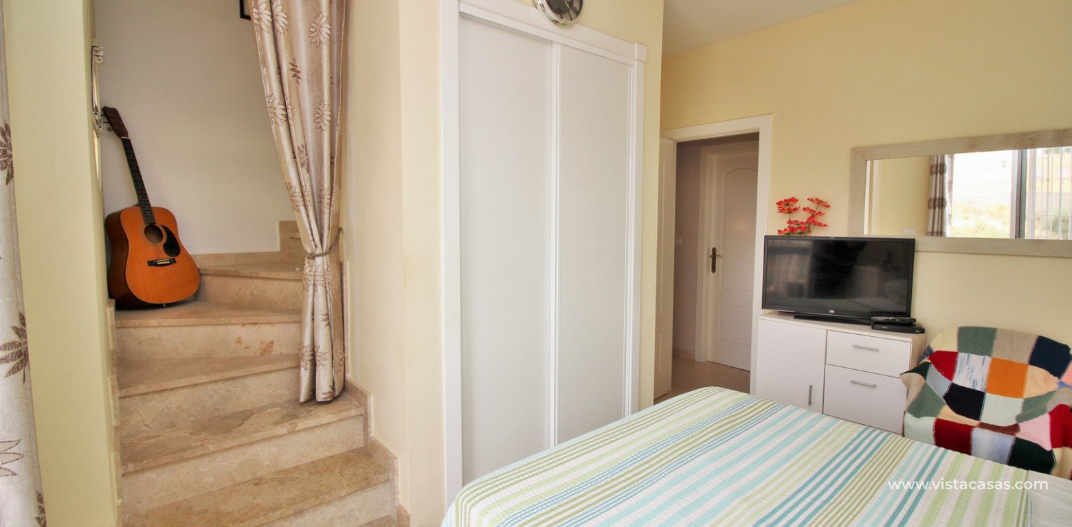 Townhouse for sale in Villamartin master bedroom fitted wardrobes solarium access