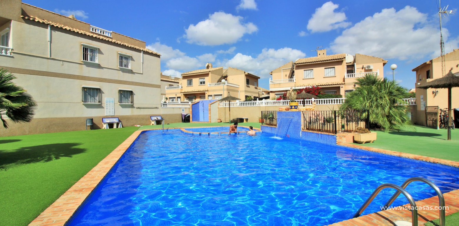 Townhouse for sale overlooking the pool in Villamartin