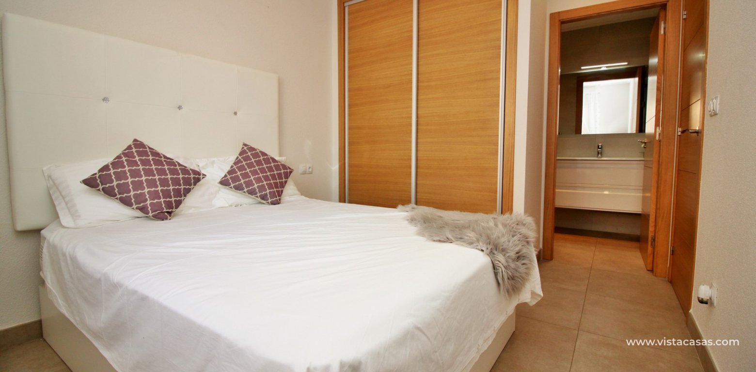 Apartment for sale in Punta Prima master bedroom fitted wardrobes