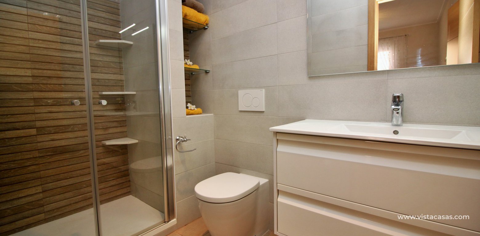 Apartment for sale in Punta Prima en-suite bathroom