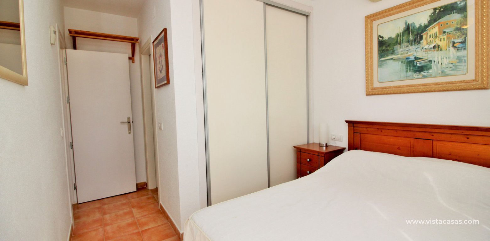 Apartment for sale in Panorama Golf Villamartin master bedroom fitted wardrobes