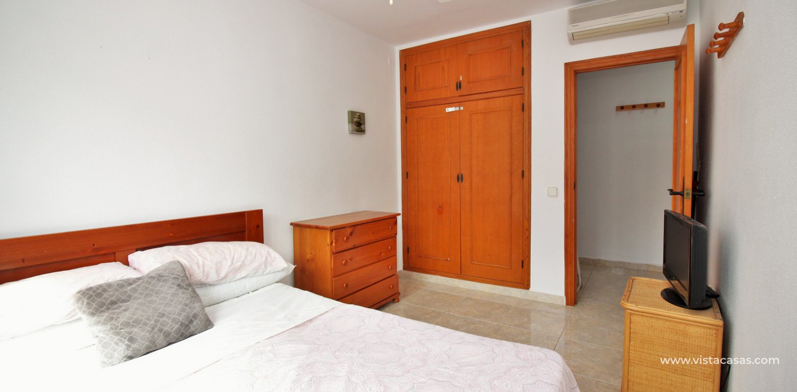 Top floor apartment for sale in the Villamartin Plaza master bedroom fitted wardrobes