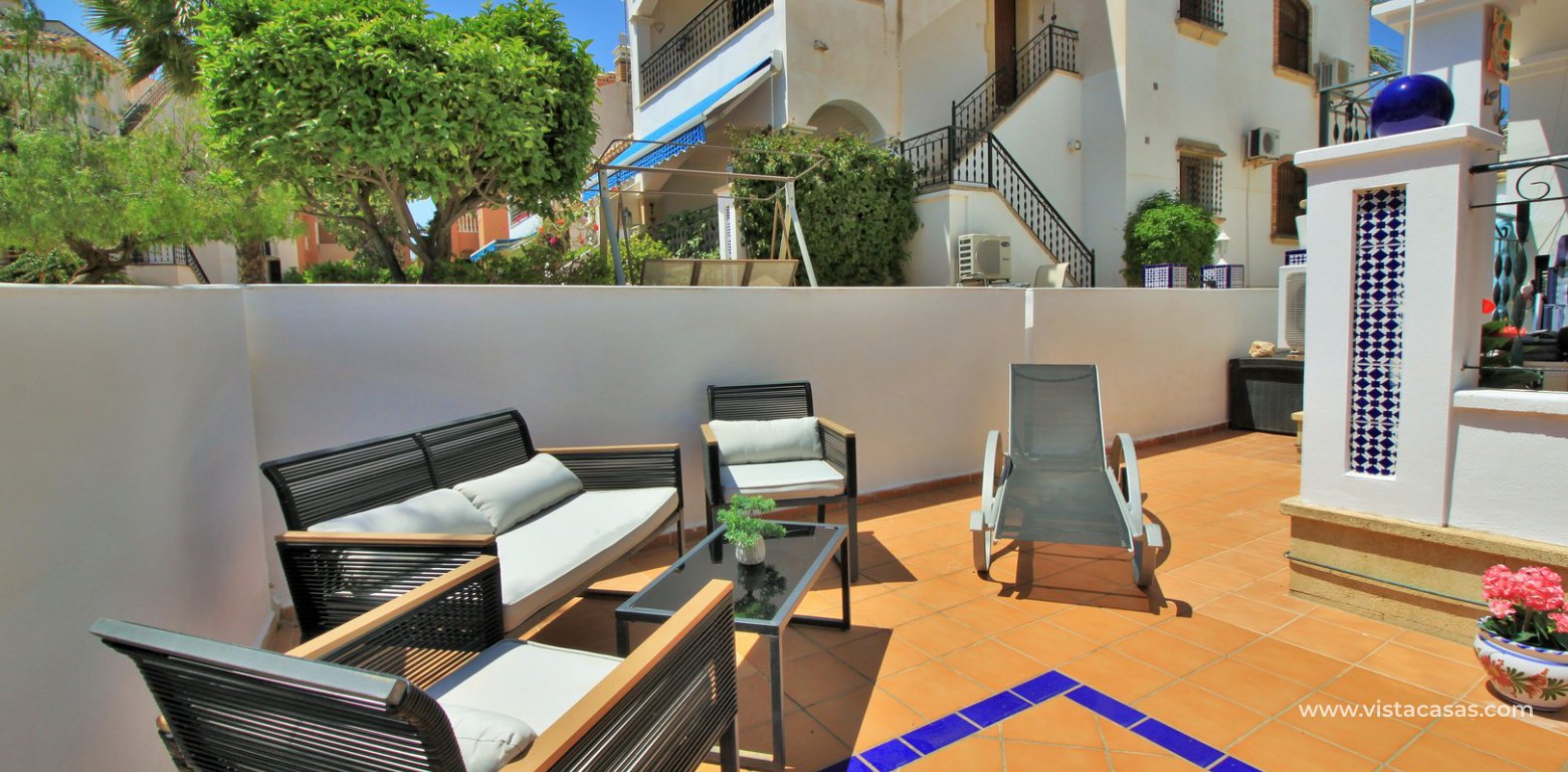 South facing ground floor apartment for sale overlooking the pool Pau 8 Villamartin front terrace
