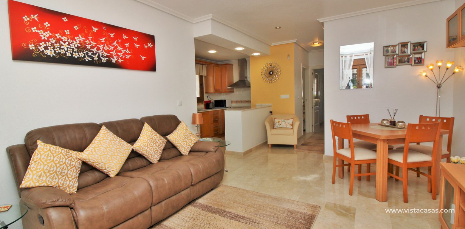 South facing ground floor apartment for sale overlooking the pool Pau 8 Villamartin lounge 2