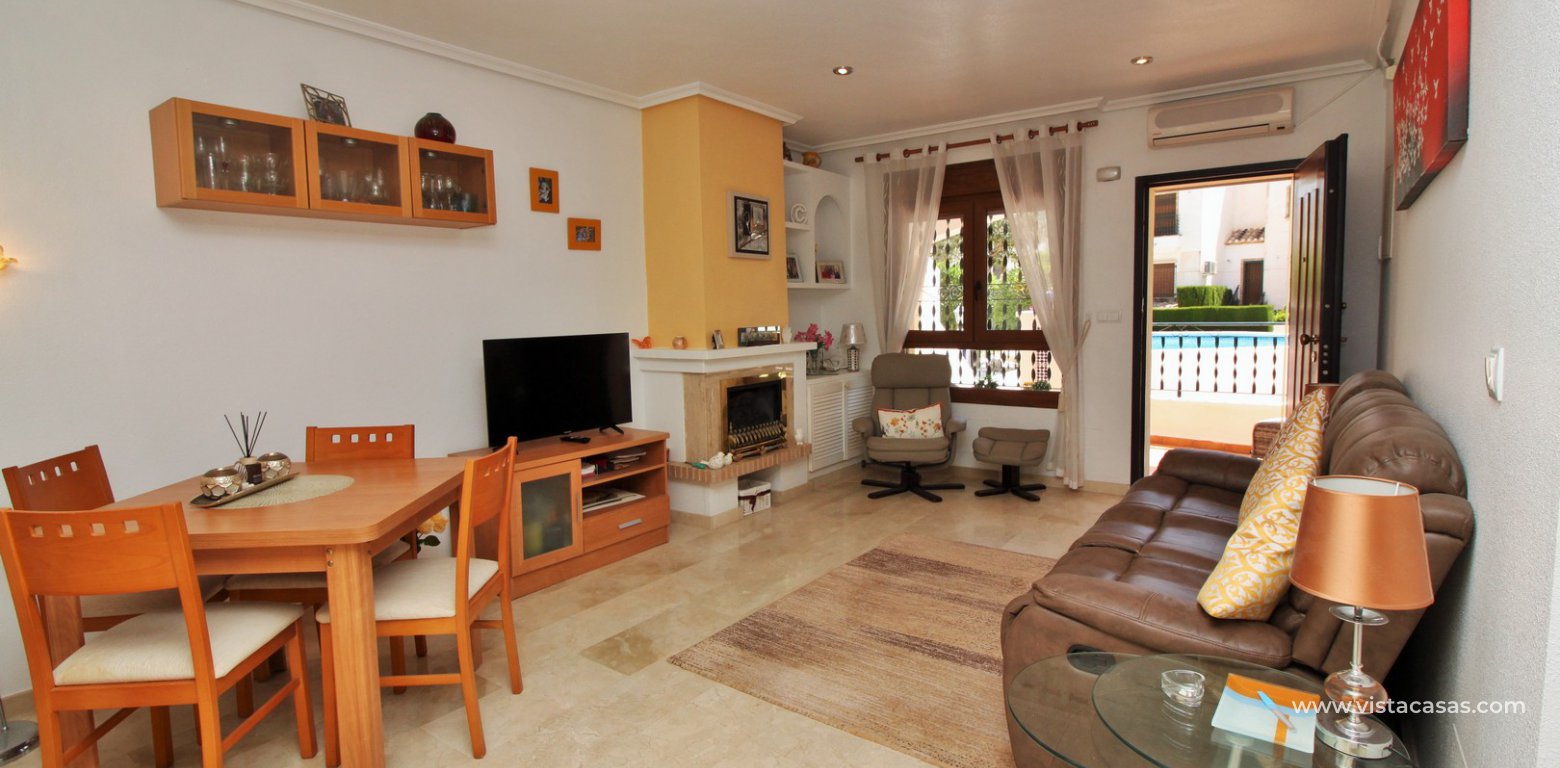 South facing ground floor apartment for sale overlooking the pool Pau 8 Villamartin lounge diner