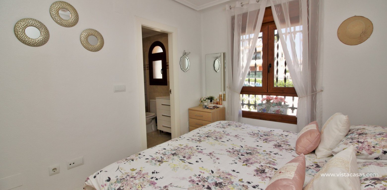 South facing ground floor apartment for sale overlooking the pool Pau 8 Villamartin master bedroom ensuite