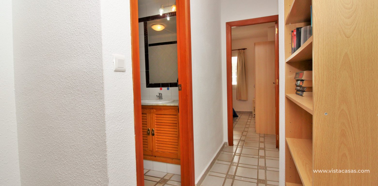 Apartment for sale overlooking the pool in Villamartin hallway