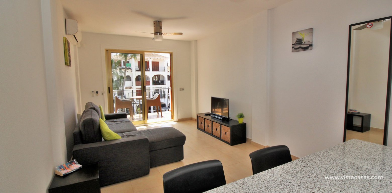 South facing apartment with tourist licence for sale in the Villamartin Plaza living-dining area