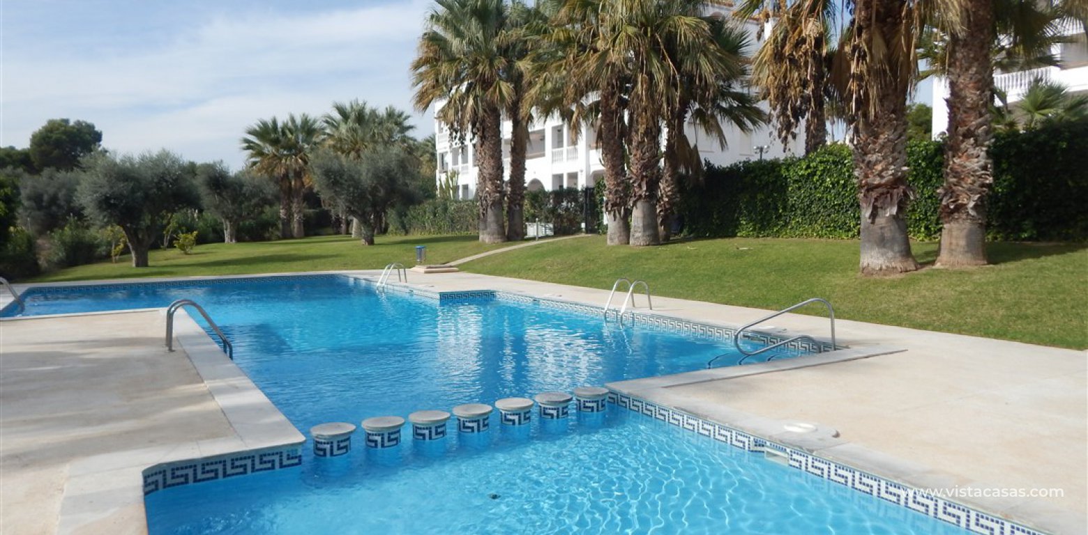 South facing apartment with tourist licence for sale in the Villamartin Plaza pool