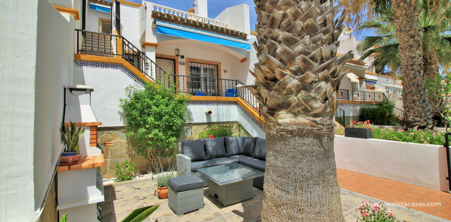 Lola bungalow for sale overlooking the pool in R12/13 Los Dolses front garden