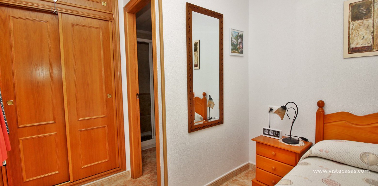 Top floor apartment for sale in R10 La Ciñuelica Punta Prima master bedroom fitted wardrobes