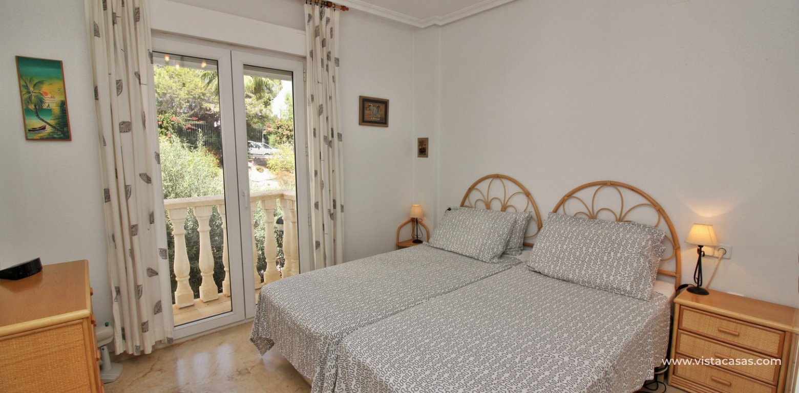 South facing apartment for sale Villamartin pool and golf views bedroom