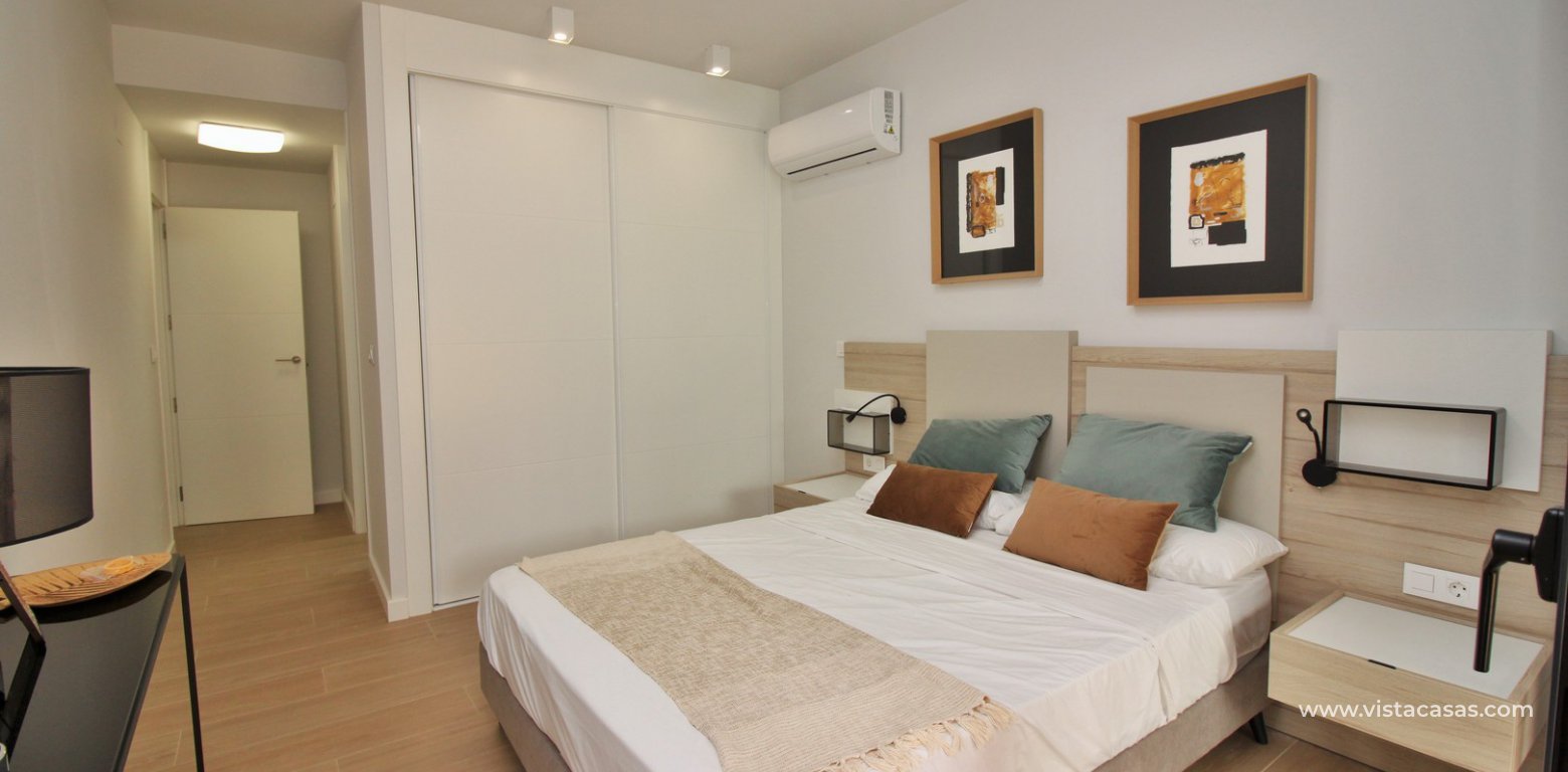 Ground floor apartment for sale Palapa Golf Villamartin master bedroom fitted wardrobes