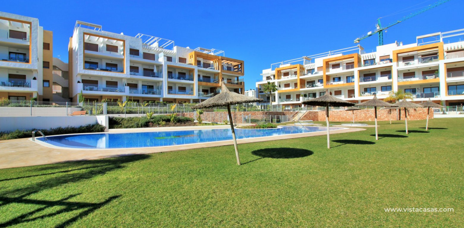 South facing apartment overlooking the pool for sale in Residencial Gala Los Dolses Orihuela Costa gardens