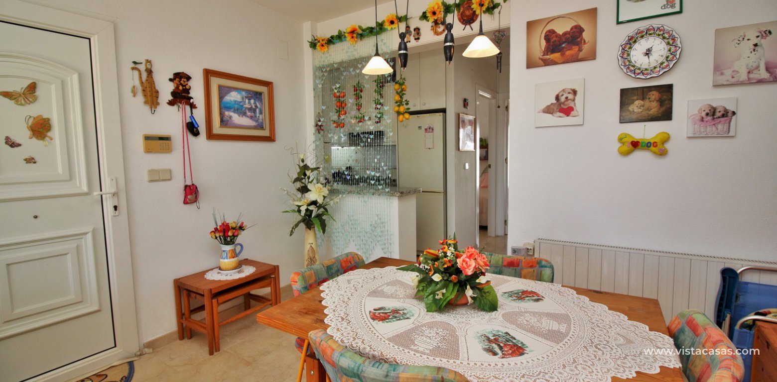 Top floor apartment overlooking the pool for sale La Rioja Los Dolses dining area