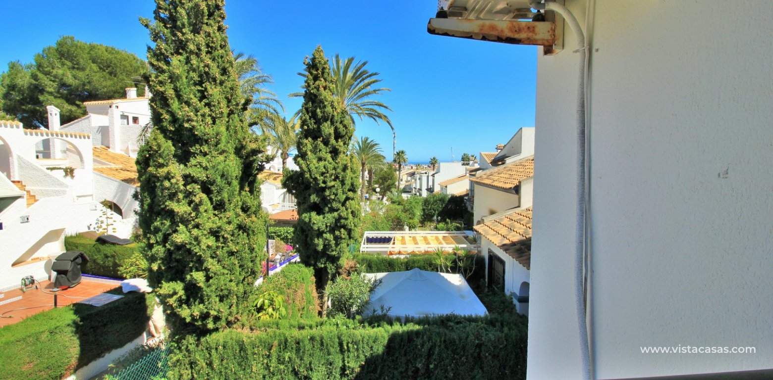 Top floor apartment overlooking the pool for sale La Rioja Los Dolses master bedroom Juliet balcony sea view