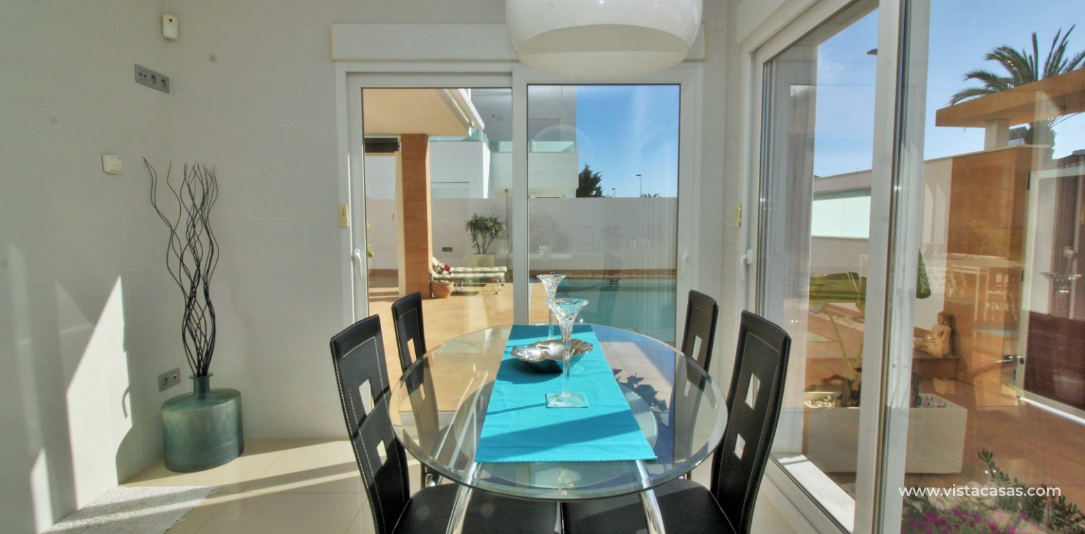 Luxury 5 bedroom detached villa with private pool for sale in Mil Palmeras kitchen dining area