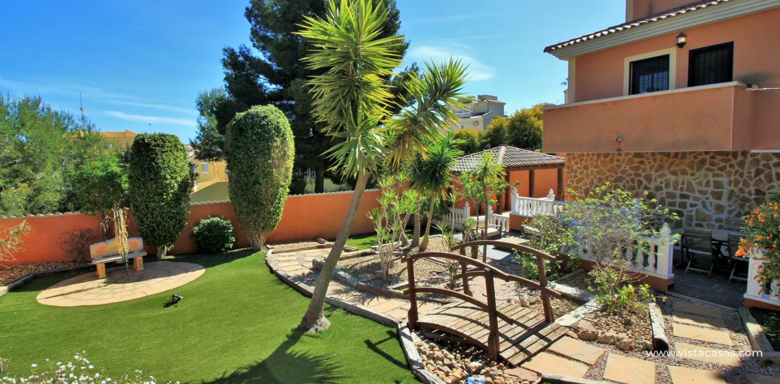 Modern 5 bedroom detached villa with private pool and large plot for sale Villamartin rear garden 2