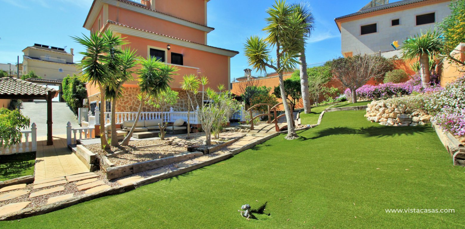 Modern 5 bedroom detached villa with private pool and large plot for sale Villamartin back garden