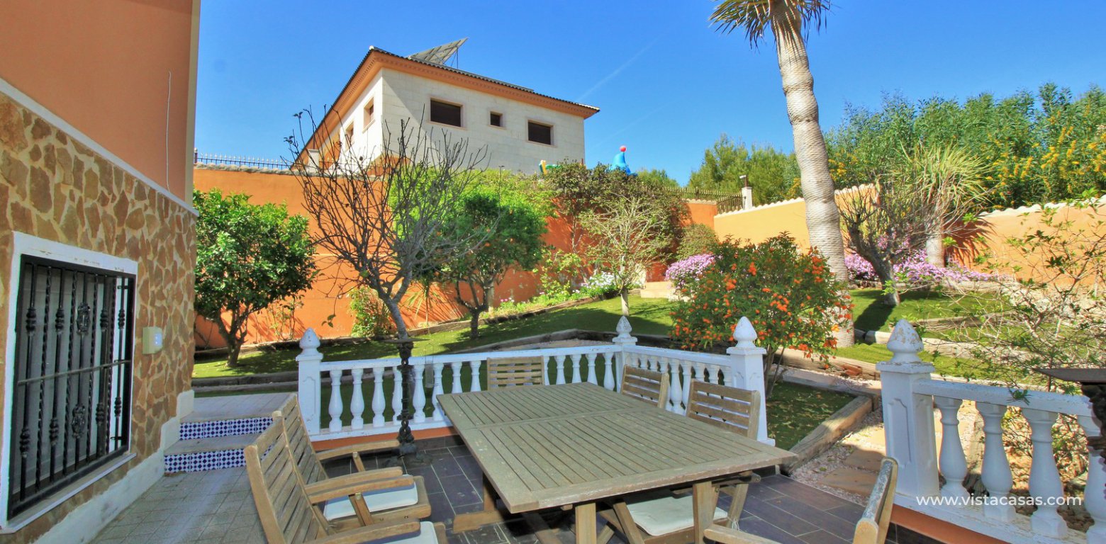 Modern 5 bedroom detached villa with private pool and large plot for sale Villamartin rear dining area