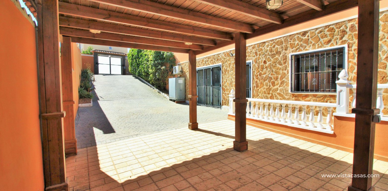 Modern 5 bedroom detached villa with private pool and large plot for sale Villamartin carport