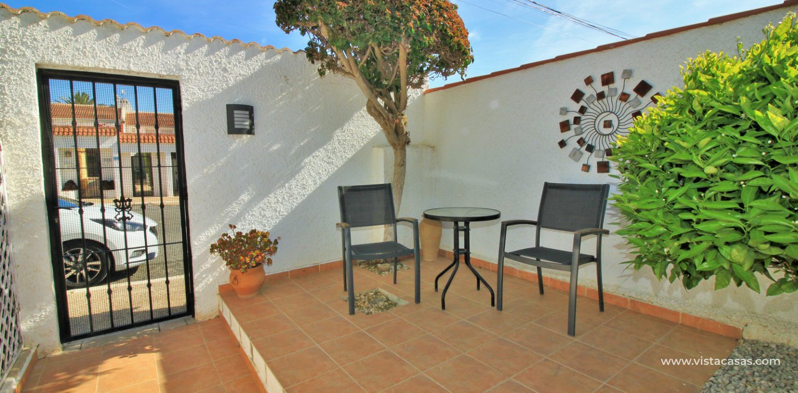 South facing renovated bungalow for sale Lomas de Don Juan Cabo Roig front seating area