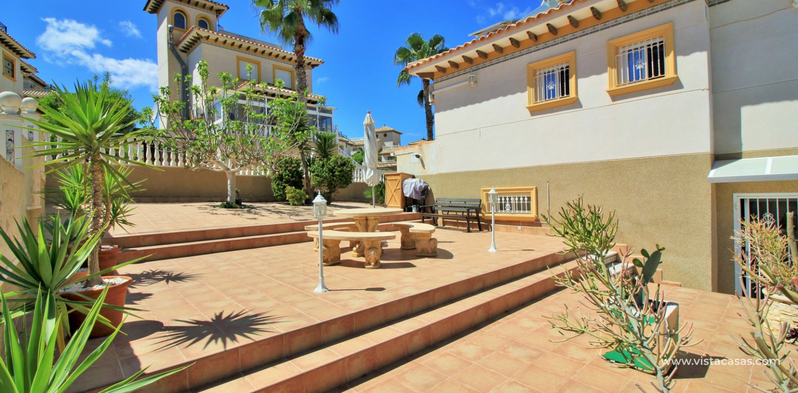Detached villa with private pool for sale Pinada Golf II Villamartin side terrace