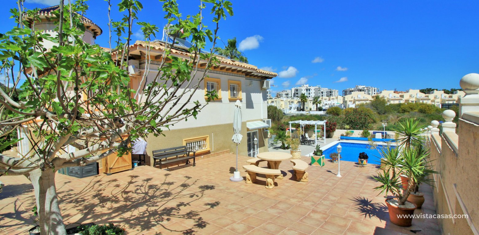 Detached villa with private pool for sale Pinada Golf II Villamartin rear terrace
