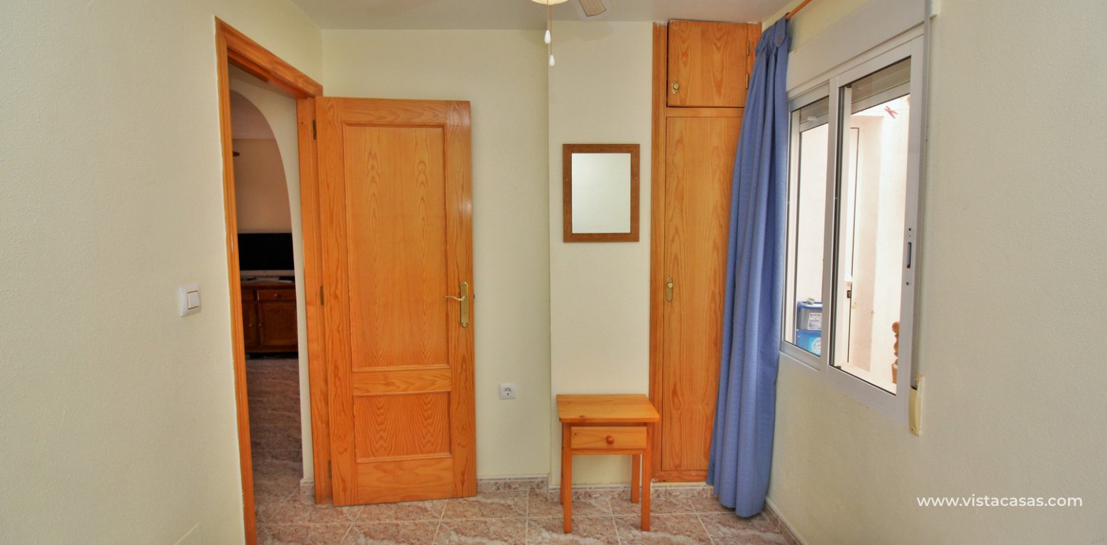 South facing ground floor apartment for sale in Villamartin twin bedroom fitted wardrobe