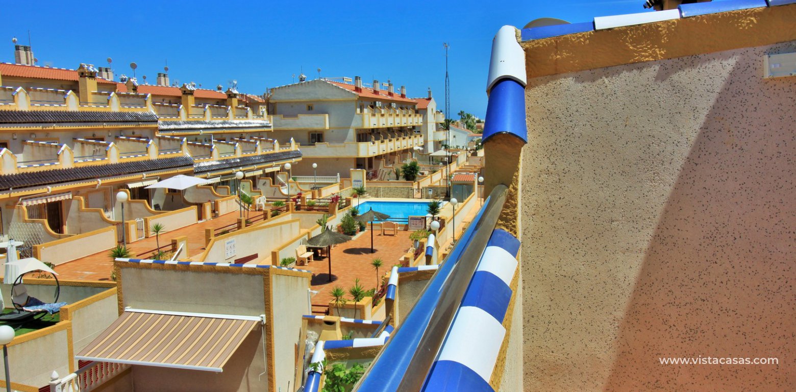 Townhouse for sale Amapolas VII Playa Flamenca roof terrace pool view