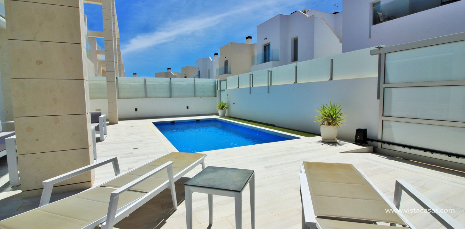 Villa for sale in Palm Beach III Lomas de Cabo Roig pool area