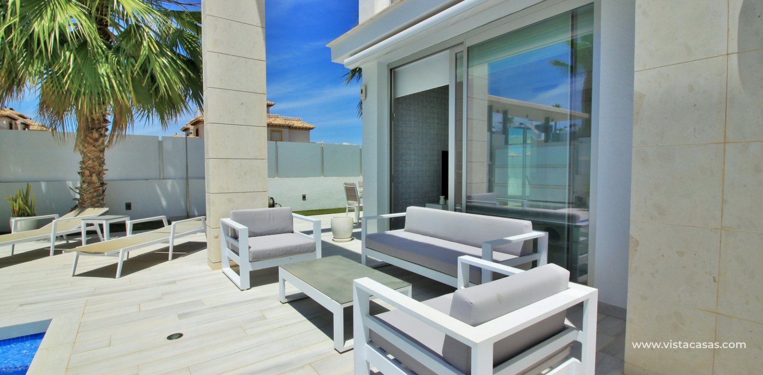 Villa for sale in Palm Beach III Lomas de Cabo Roig seating area