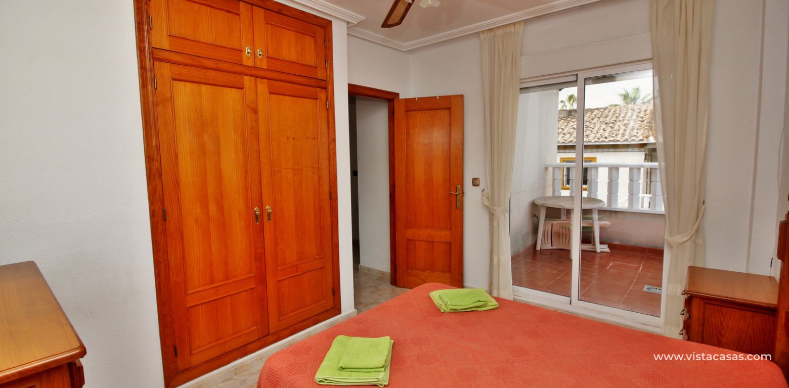 Detached villa with garage for sale Pinada Golf I Villamartin master bedroom balcony