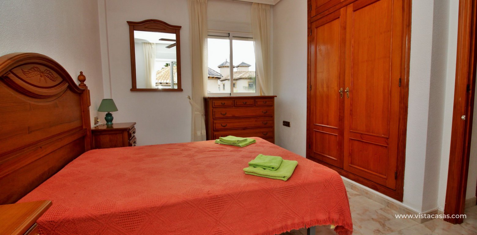 Detached villa with garage for sale Pinada Golf I Villamartin master bedroom fitted wardrobes