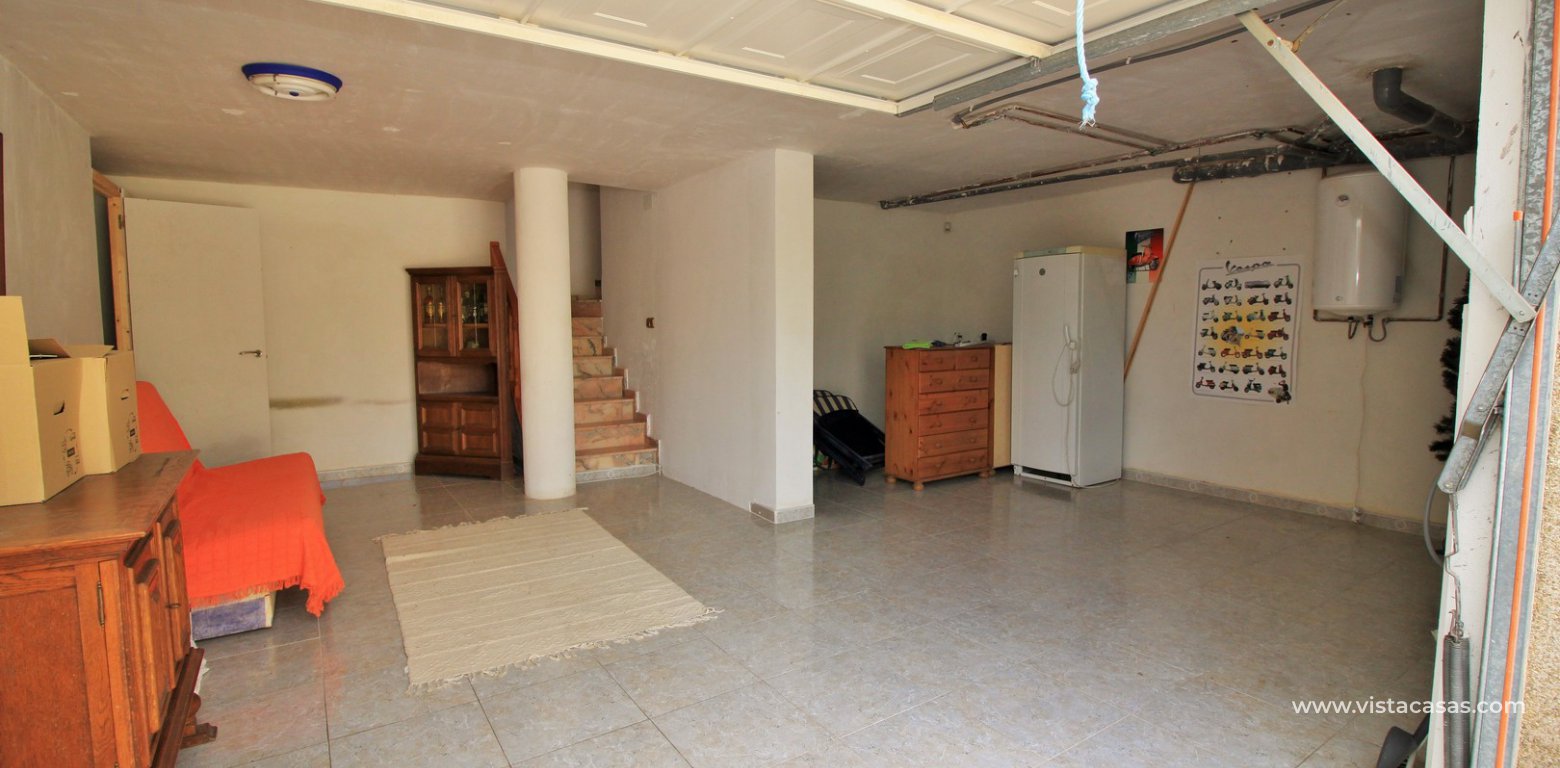 Detached villa with garage for sale Pinada Golf I Villamartin garage 2