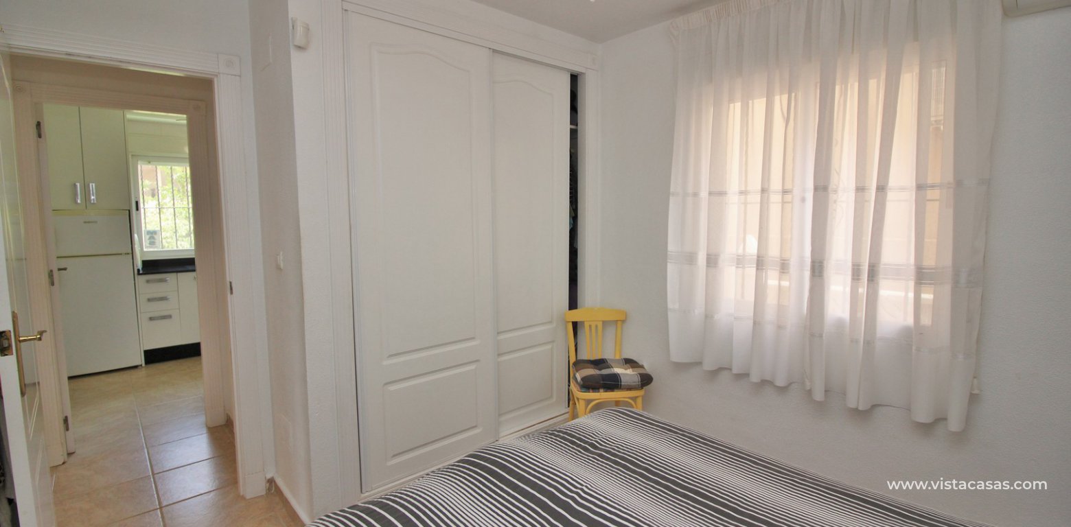 Detached 3 bedroom villa overlooking the pool for sale Torregolf I Villamartin downstairs bedroom fitted wardrobes