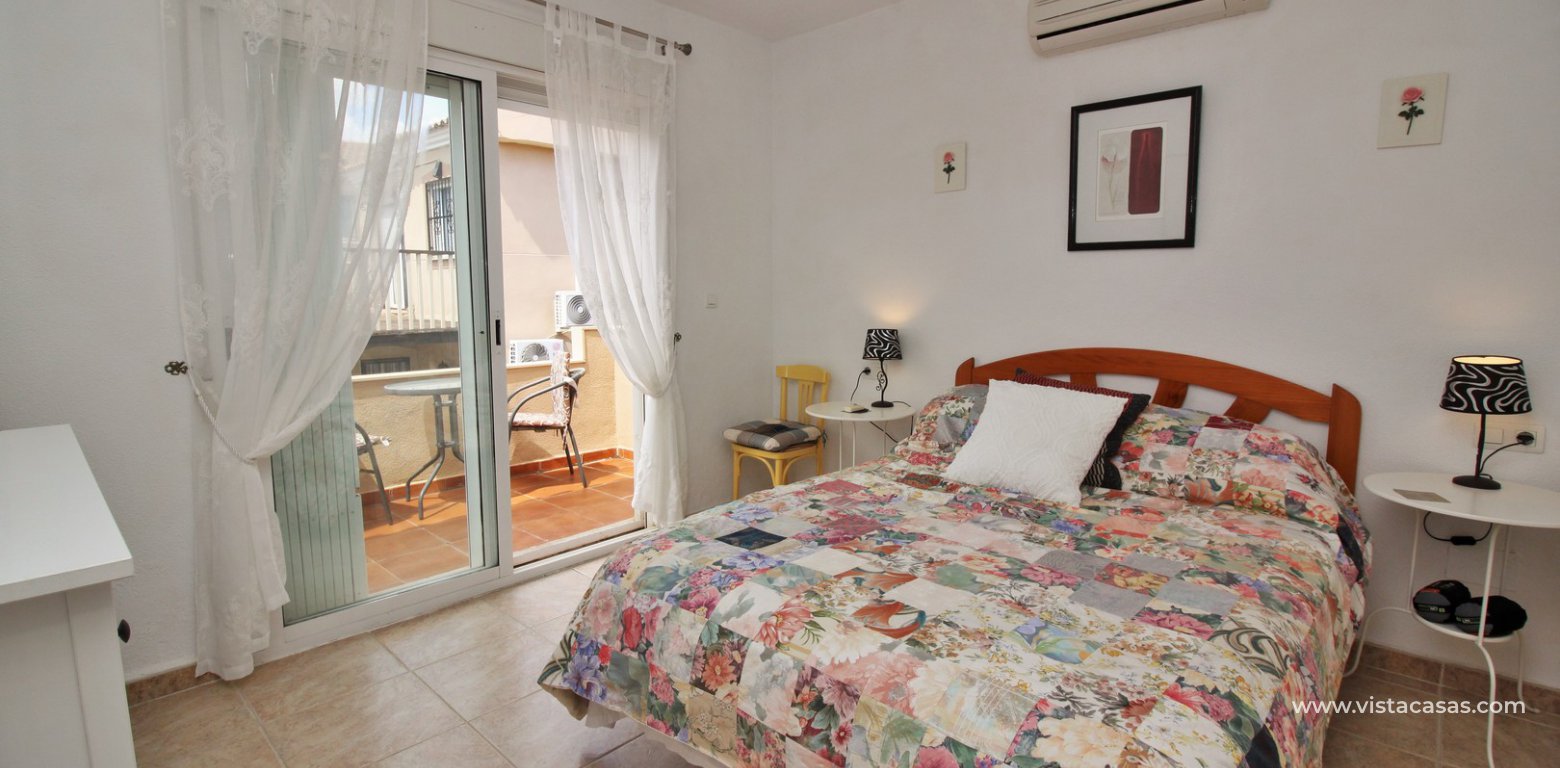 Detached 3 bedroom villa overlooking the pool for sale Torregolf I Villamartin master bedroom