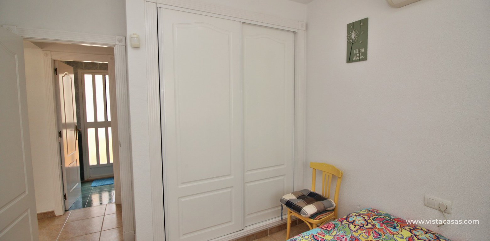 Detached 3 bedroom villa overlooking the pool for sale Torregolf I Villamartin twin bedroom fitted wardrobes