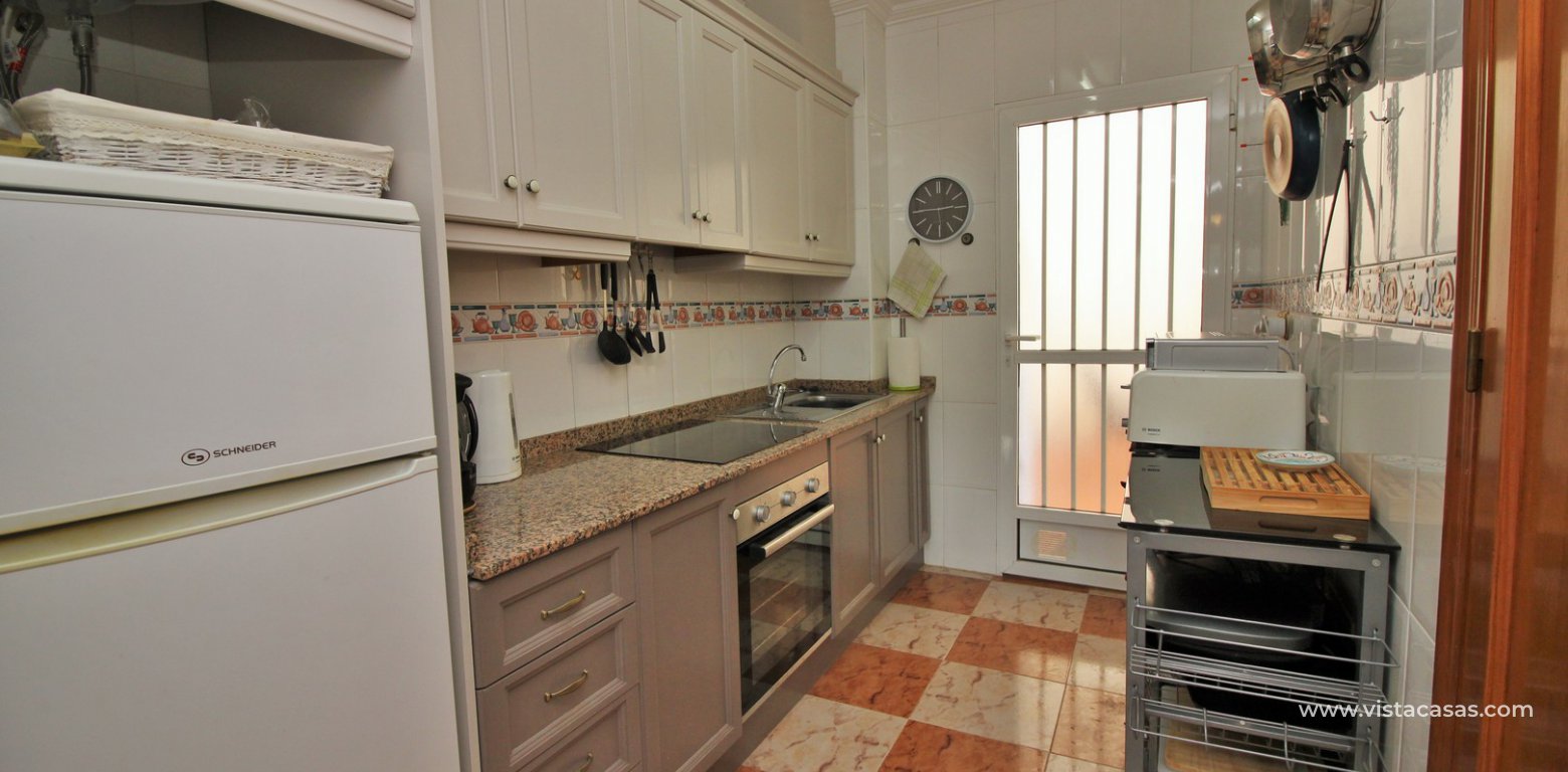 Ground floor apartment for sale Pinada Golf Villamartin kitchen