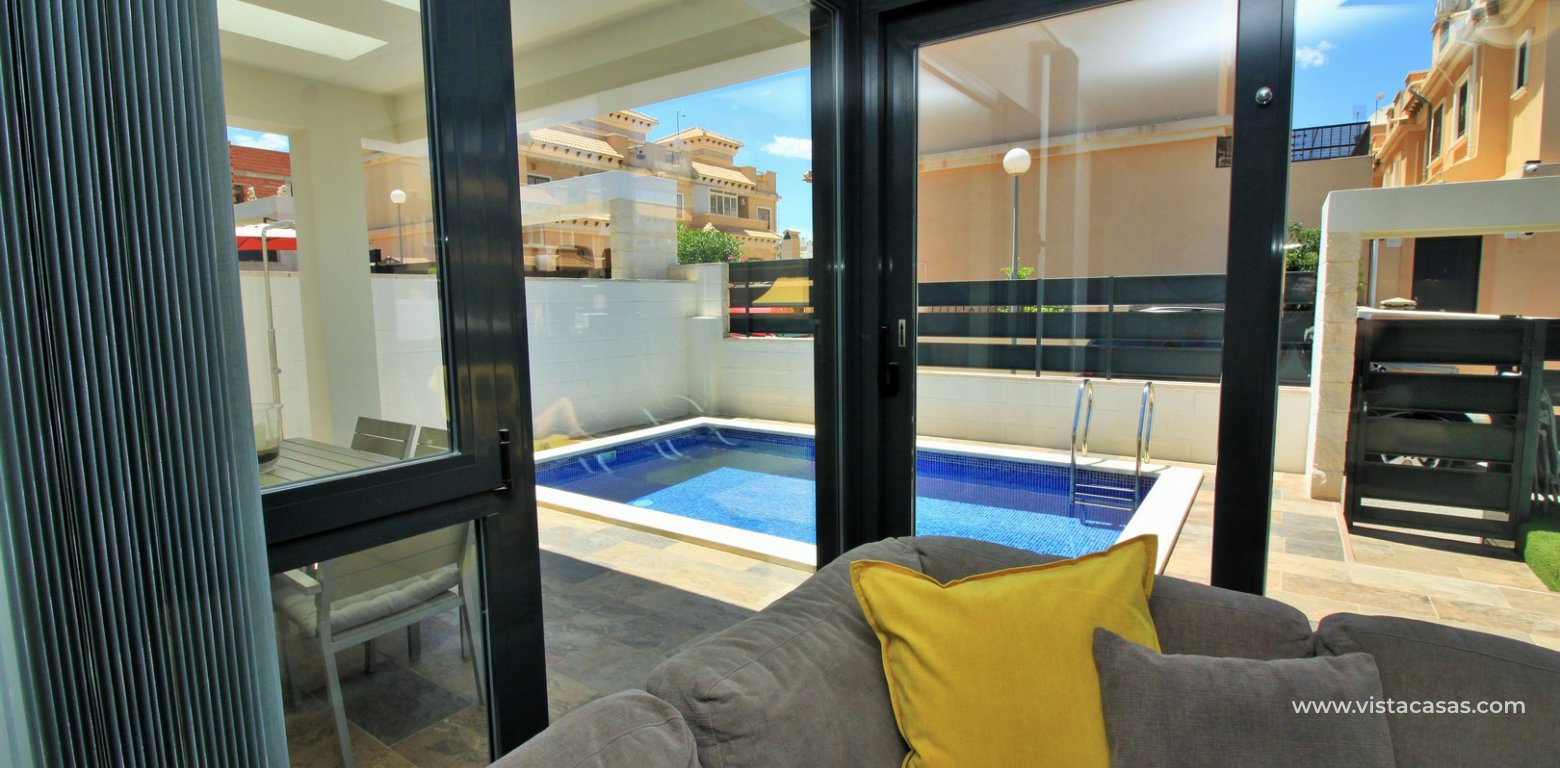 Modern villa with private pool for sale Villamartin lounge pool view
