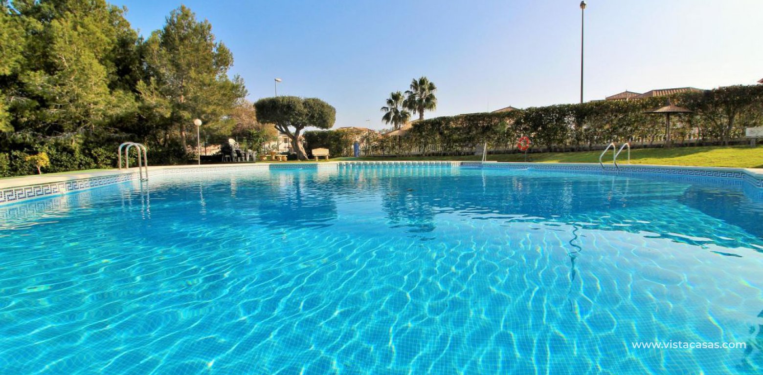 Quad house for sale Pinada Golf II Villamartin communal pool
